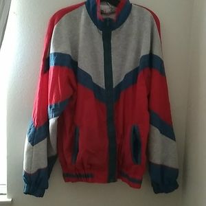 Grey, red and blue windbreaker